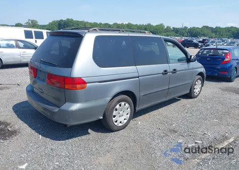 2001 Honda Odyssey Lx z USA, uszkodzony, nr VIN 2HKRL18511H513217